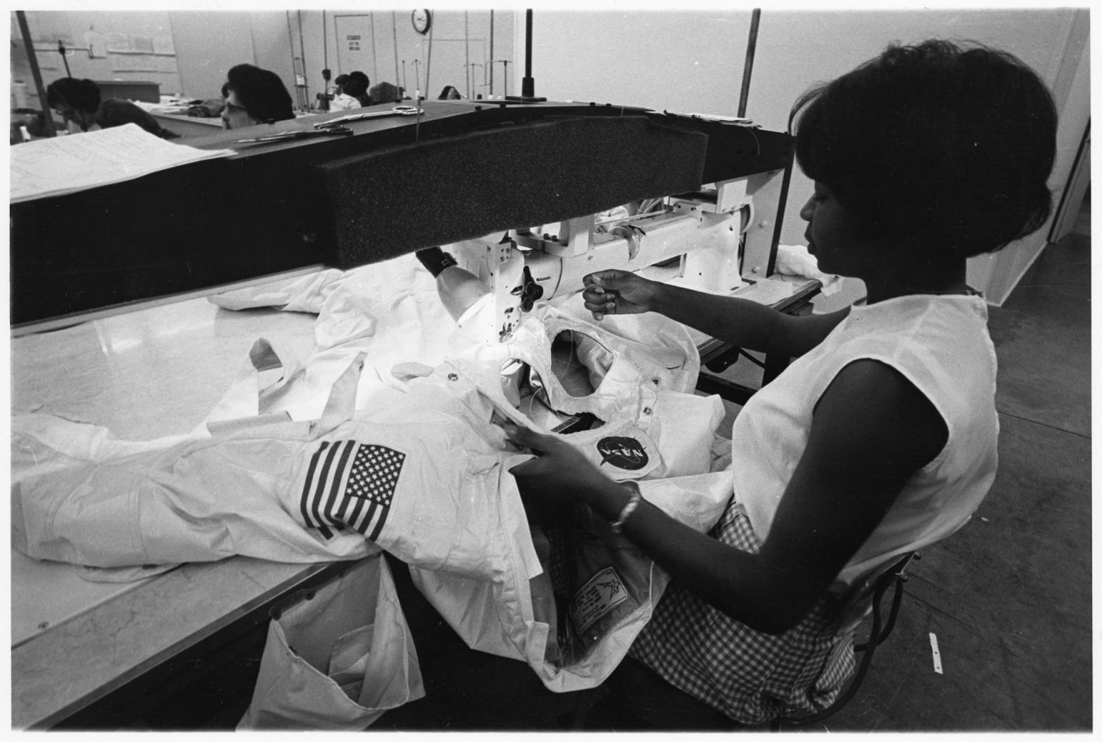 Seamstress Hazel Fellows sewing a space suit