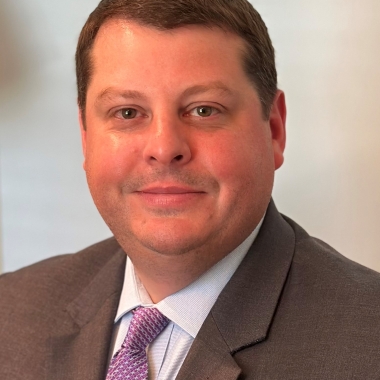 Headshot of Andrew Mosley. 