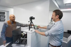 Security staff takes a photo. 