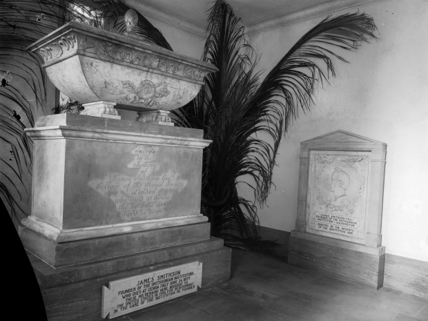 Large stone memorial with a grave marker next to it for James Smithson