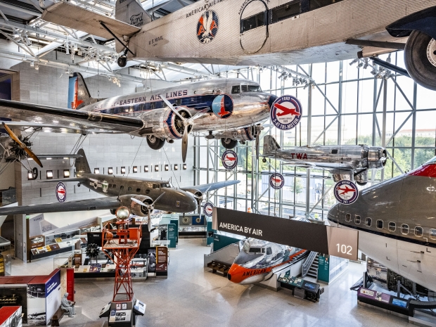 Planes are displayed in the National Air and Space Museum while hung from the ceiling