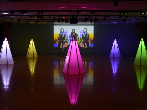 Art installation of neon tipis