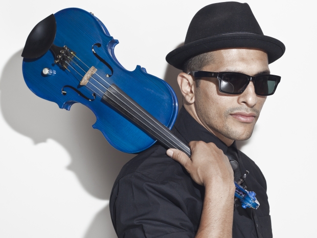 Quetzal Guerrero holding violin