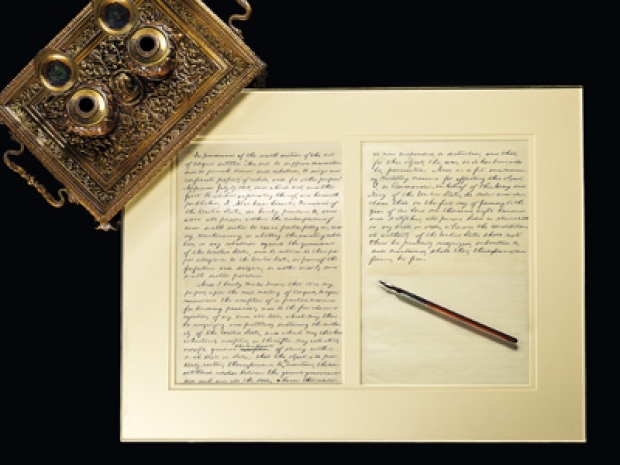 Inkwell and Emancipation Proclamation draft with Lincoln's pen
