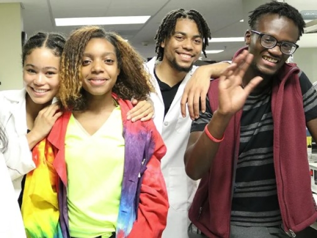 high school interns in science lab