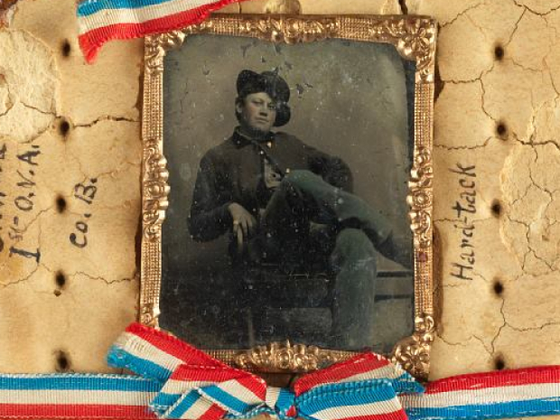 Tintype of Civil War Soldier Augustus B. Hayes in a hardtack frame.