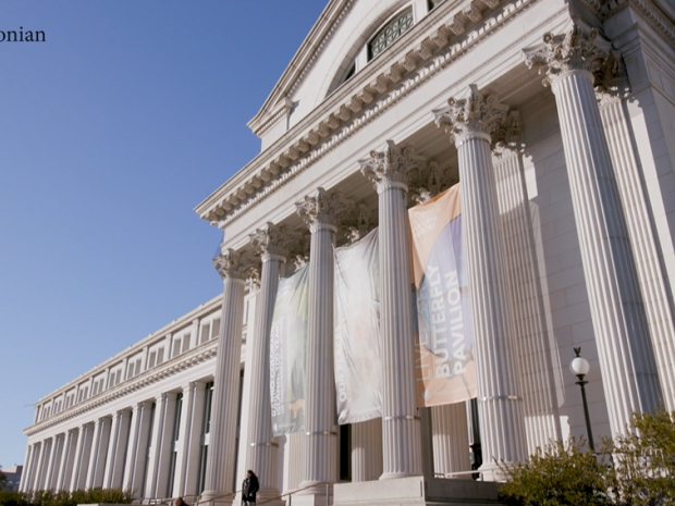 Screenshot of the exterior of a building with five columns and large portico.