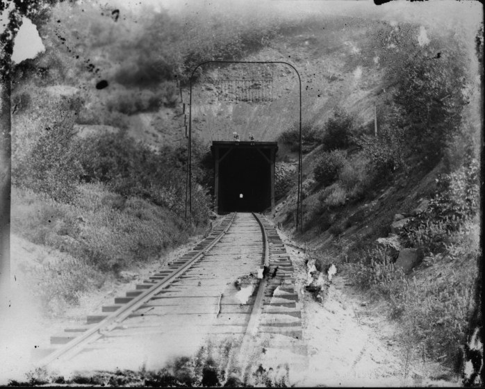 Black and white photo of train tunnel 13