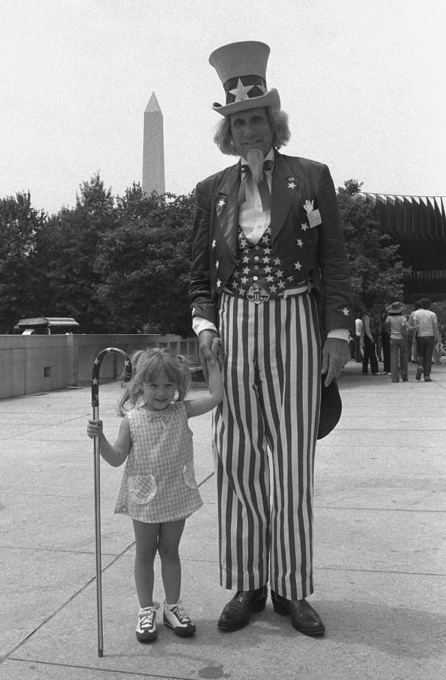 photograph of Uncle Sam in front of the Washington Monument at the National Museum of American History